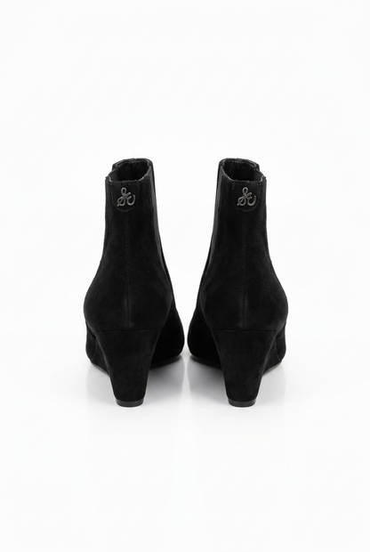 Boots left-facing side view on white background