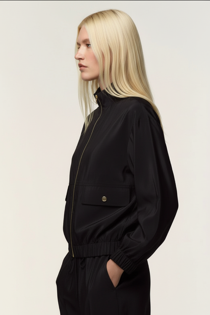 Model in black bomber jacket - side profile