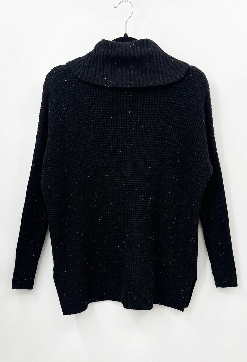 Straightened sweater back view on hanger