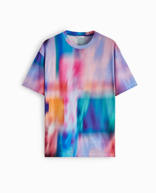 A round neck, short-sleeved Zara t-shirt with an abstract multicolor print.